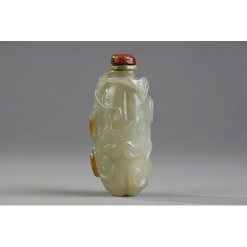 Celadon green nephrite jade snuffbottle in the shape of .pumpkin with its leaves and another small fruit in a reddish brown inclusion - China 19th century